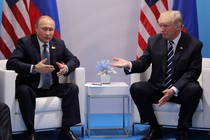 Russia's President Vladimir Putin talks to U.S. President Donald Trump 