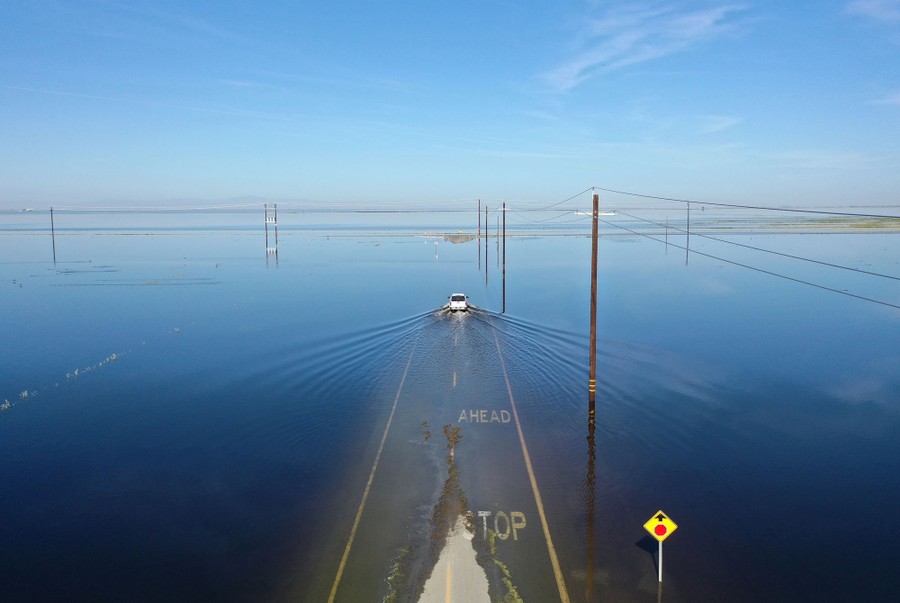 An elevated view of a broad, flat, flooded area