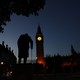 Dawn breaks behind the Houses of Parliament and the statue of Winston Churchill in Westminster, London, on June 24, 2016. 