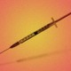 A blurred vaccine syringe