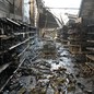 Charred goods in a grocery store of the destroyed Amstor mall in Kremenchuk, one day after it was hit by a Russian missile strike according to Ukrainian authorities