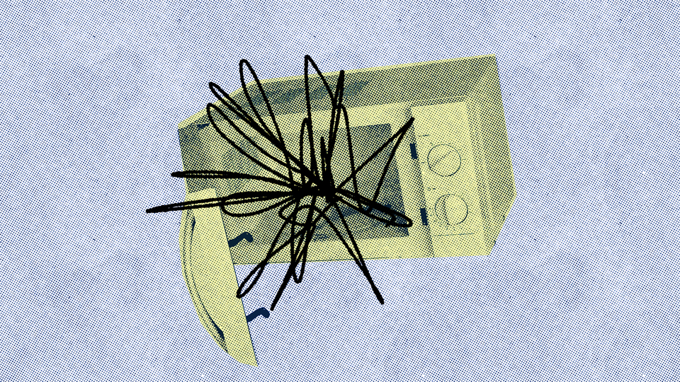 An image of a microwave with scribbles