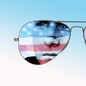 Photo illustration of stills from the movie Top Gun set inside a pair of aviator sunglasses.