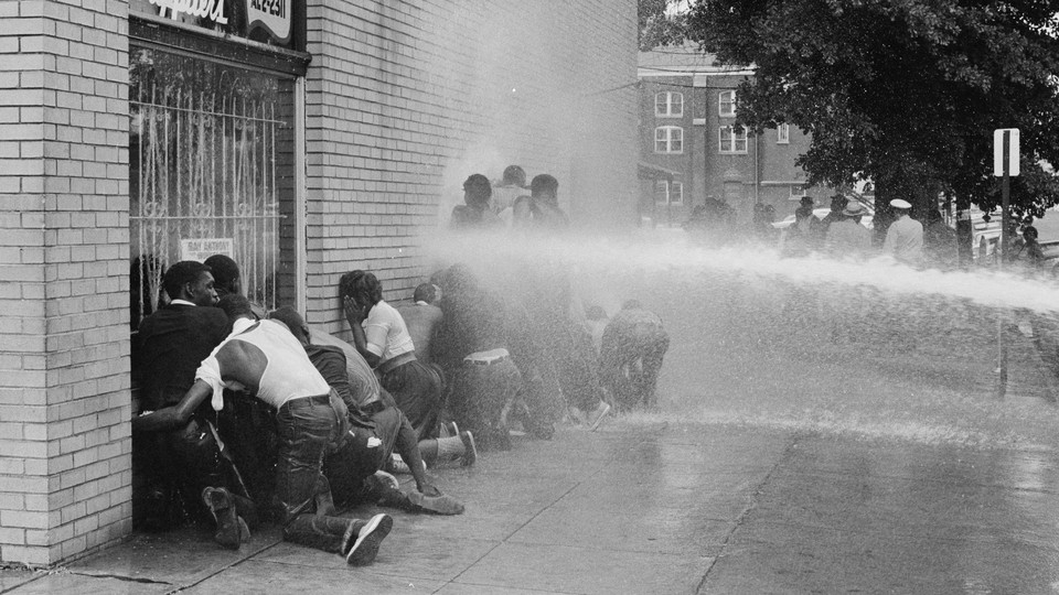 Police deploying fire hoses on African-American protestors in Birmingham, Alabama, May 1963.
