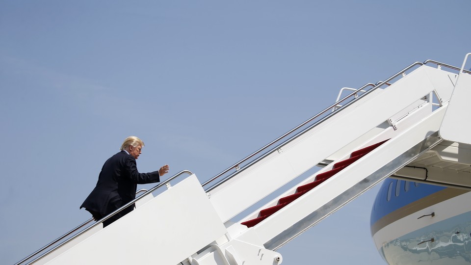 President Trump climbs aboard Air Force One 