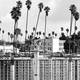 Construction workers help build a mixed-use apartment complex that will hold more than 700 units of apartment housing and 95,000 square feet of commercial space, on January 25, 2024, in Los Angeles, California.