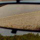 A photo of a car's rearview mirror