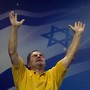 A Christian worshipper prays during an evangelical rally in Jerusalem.