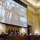 Donald Trump appears on video behind the Select Committee to Investigate the January 6th Attack
