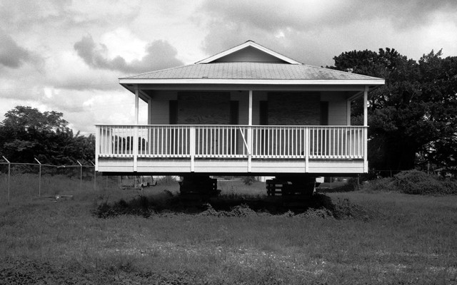 A foreclosed house stands vacant and boarded up in Fort Myers, Florida, in this photo taken during the 2008 recession
