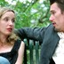 Julie Delpy and Ethan Hawke talking on a bench in Before Sunset
