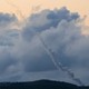 A photograph taken from the southern Lebanese area of Marjeyoun shows trails of rockets fired from Lebanon towards Israel