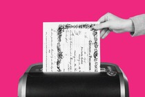 A marriage certificate going in a shredder