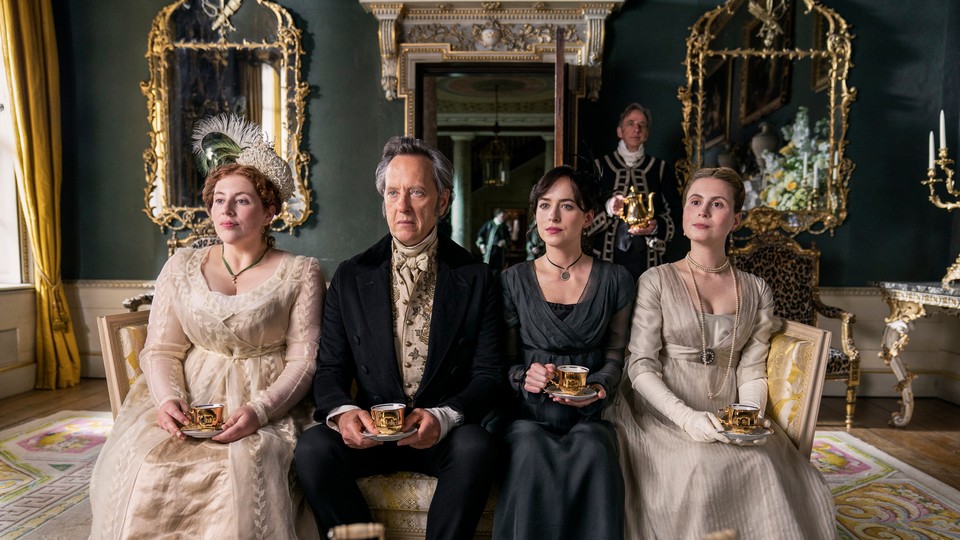 Lydia Rose Bewley, Richard E. Grant, Dakota Johnson, and Yolanda Kettle sitting in a parlor holding teacups in "Persuasion"