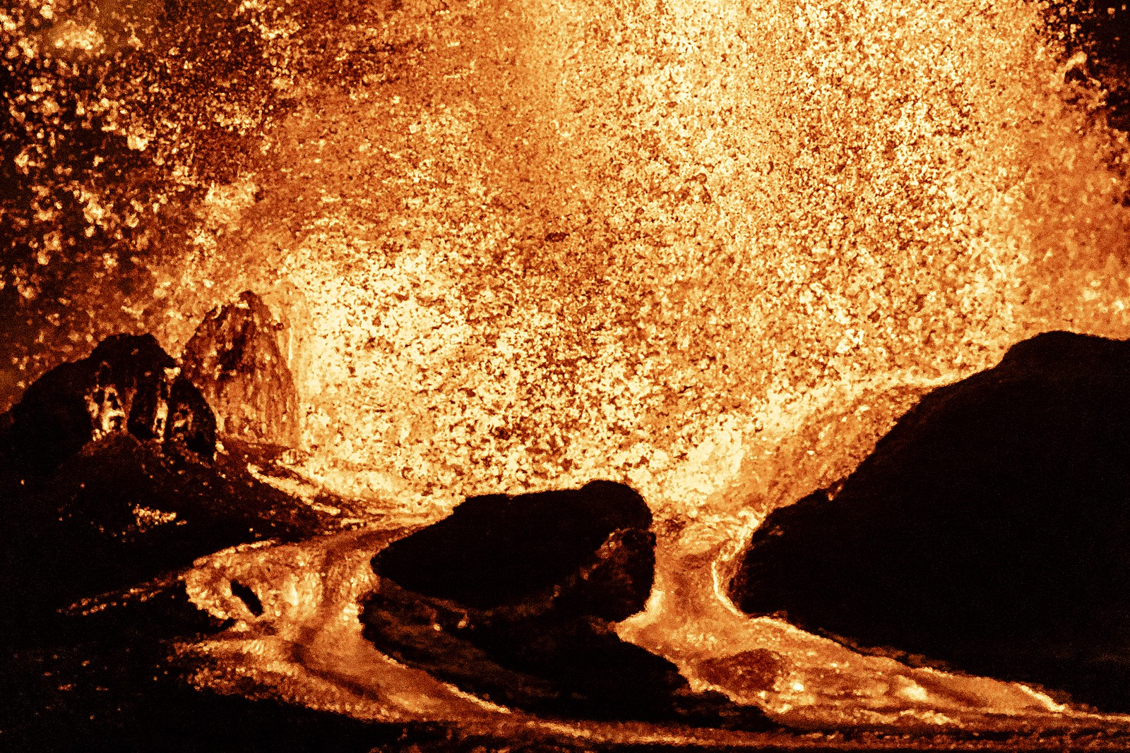 A tight view of a fountain of lava erupting