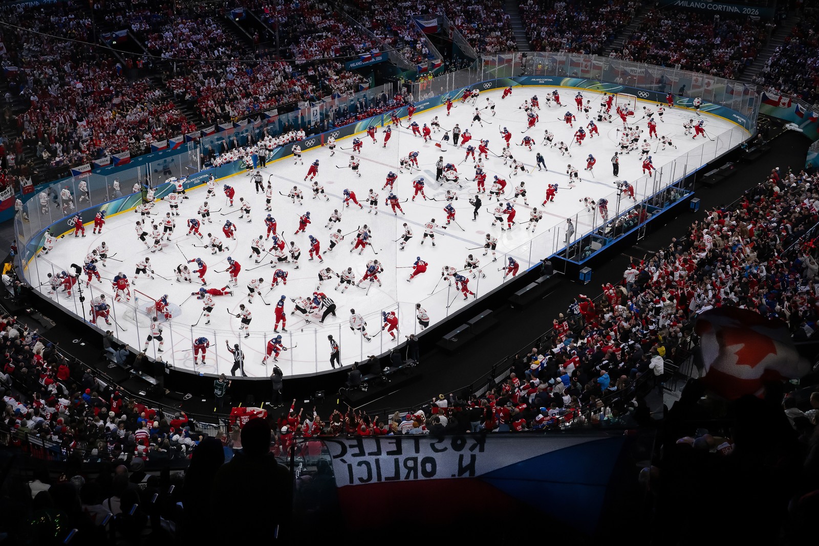 A digital composite view of an ice hockey game, making it appear as if dozens of players were on the ice simultaneously, evenly spaced-out.