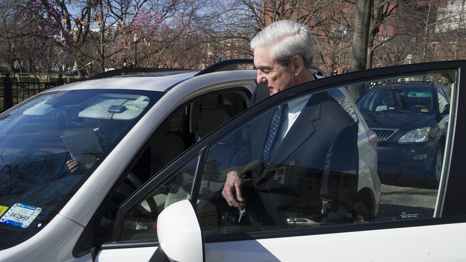 Robert Mueller getting into a car
