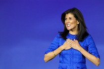 Nikki Haley clasps her hands over her heart