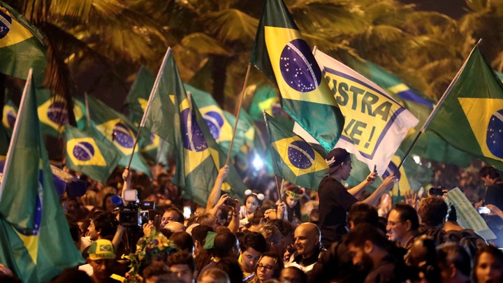 Supporters of Jair Bolsonaro celebrate his victory in Brazil's presidential elections.