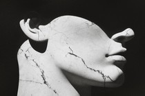 Marble bust in shadows