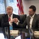 Donald Trump holds hands with Peter Thiel in 2016