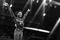 simone biles smiles triumphantly