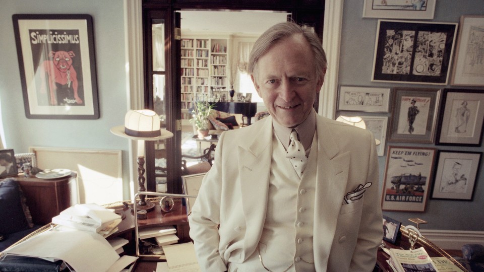 Tom Wolfe poses in his New York apartment in 1998