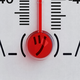 The red bulb of a glass mercury thermometer forms the face in a shrug emoji.