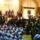 Hebrew Israelite congregants sing during Sabbath worship services, with elders and community leaders nearest the pulpit. 
