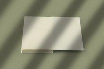 A book opened to its final, blank page