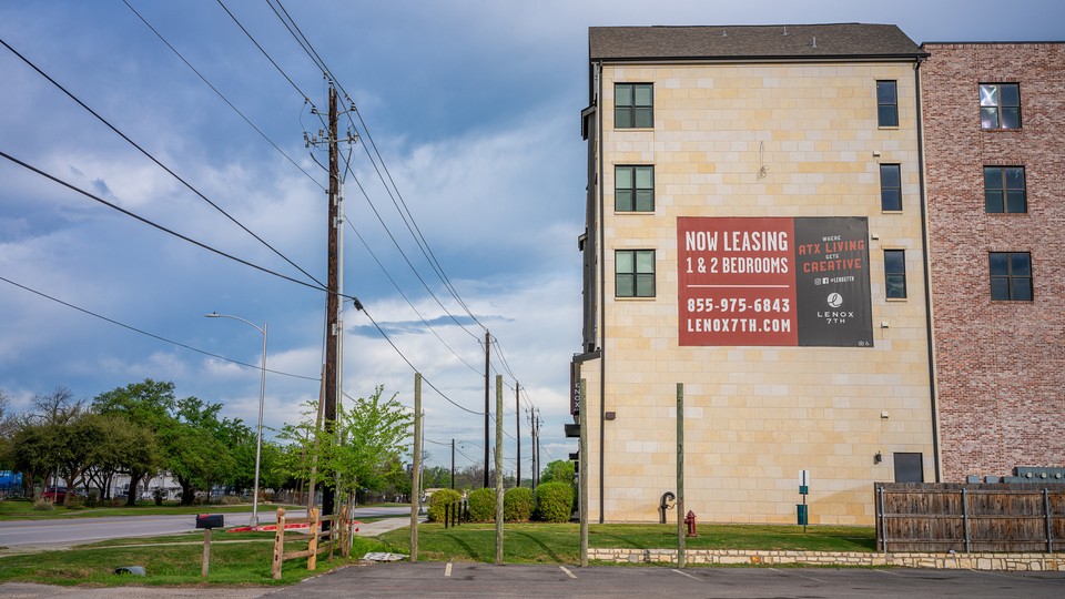 A photograph showing a building advertising apartments for lease on March 19, 2024, in Austin, Texas