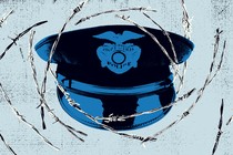 a police hat surrounded by barbed wire