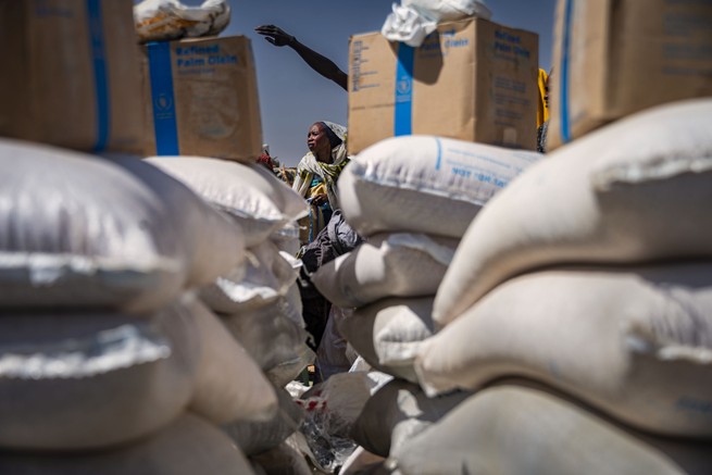 Piles of food are lined up for refugees
