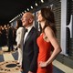 Jeff Bezos and his wife MacKenzie pose for pictures