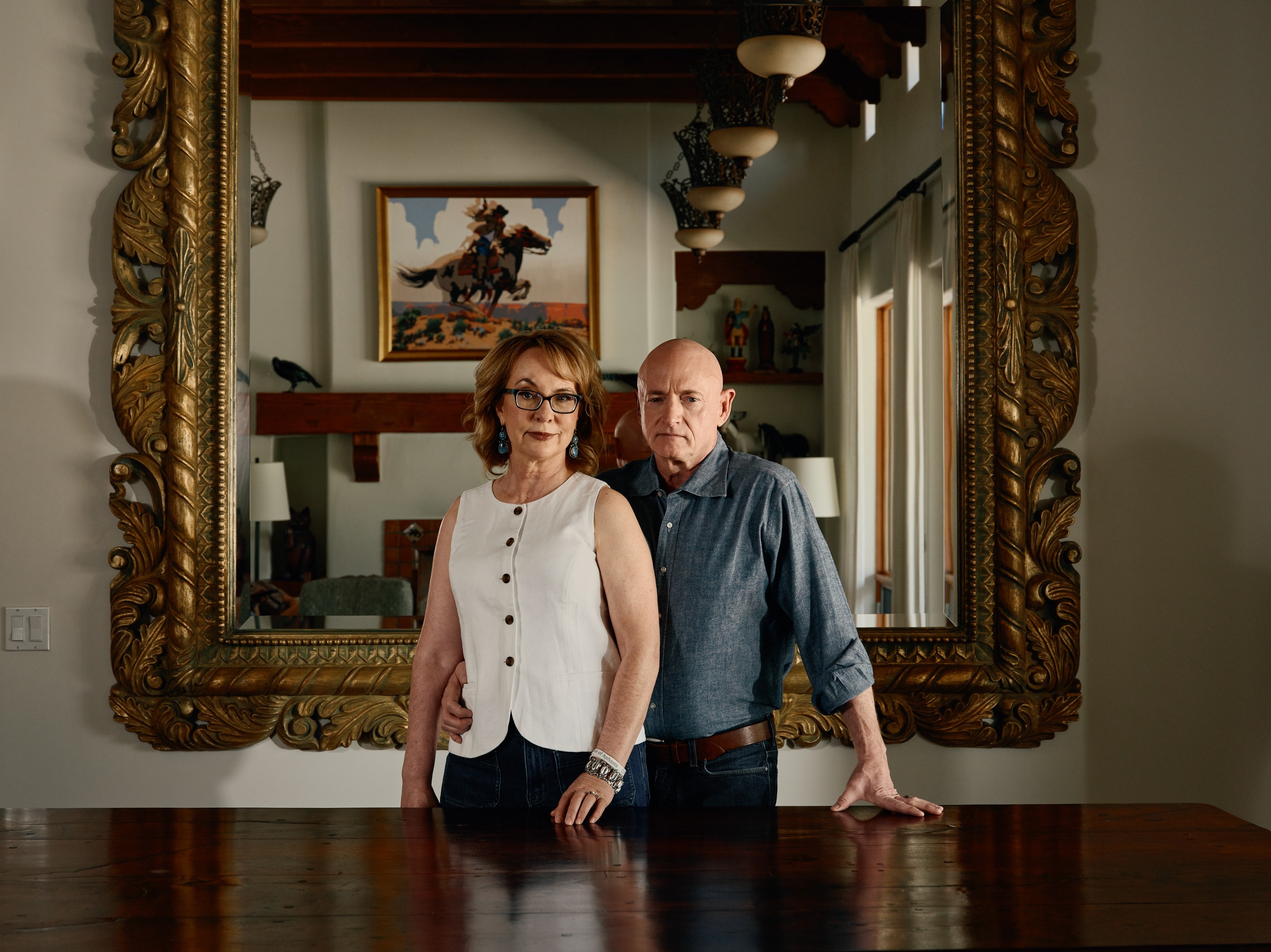 a woman and man stand together