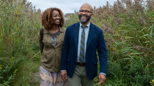 Screengrab from "American Fiction," showing Jeffrey Wright and Erika Alexander walking outdoors