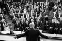 In a black-and-white photo, Donald Trump speaks to Congress.
