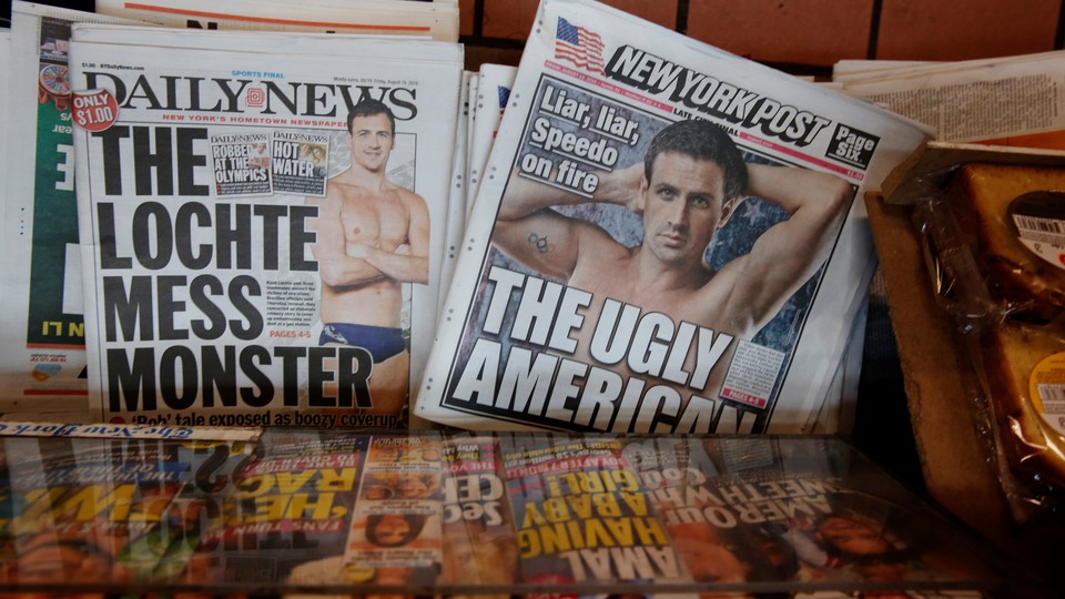 The front pages of the New York Post and the New York Daily News display the image of U.S. Olympic swimmer Ryan Lochte.