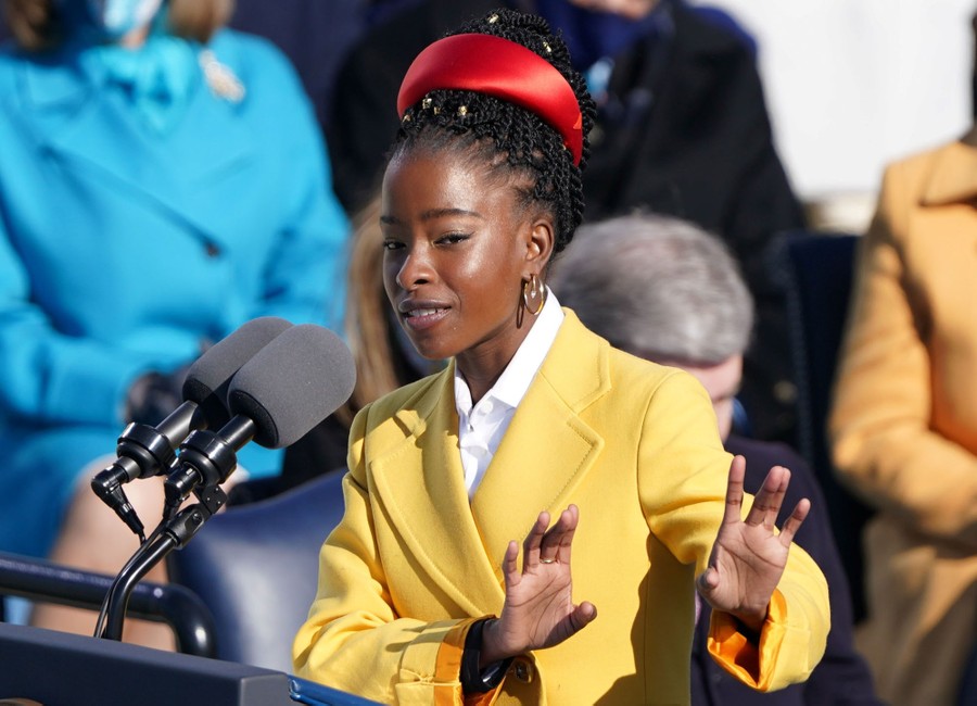 A young woman recites a poem at a lectern during the inauguration of Joe Biden.