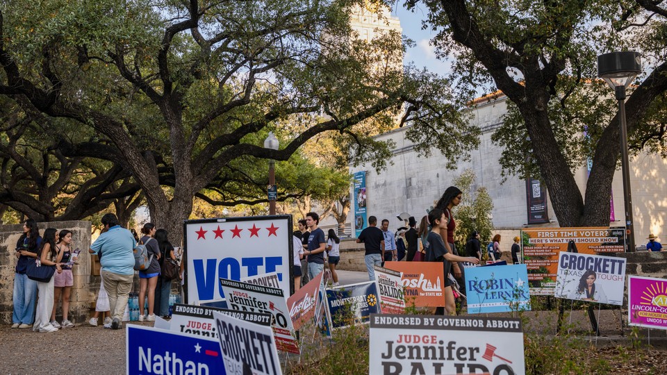 "Vote" signs on a lawn