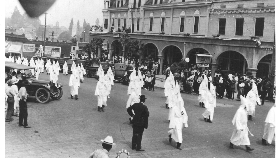 A Ku Klux Klan March in Ashland, Oregon (Date unknown; estimated to be from the 1920s)