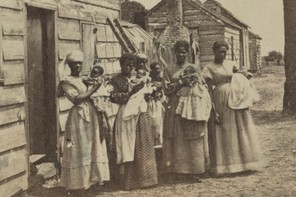 A photograph showing women holding babies