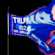 A Trump flag dissolving into swirls