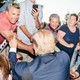 Real-estate mogul and Republican presidential candidate Donald Trump greets supporters after speaking at a rally at the Weirs Beach Community Center in Laconia, New Hampshire.
