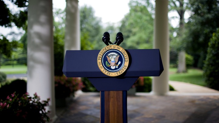 Photo of an empty presidential podium outside the Oval Office at the White House