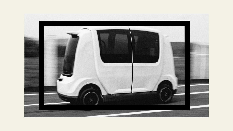 A black-and-white image of a driverless car in motion