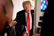 A photograph of Donald Trump with his mouth open