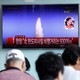 People watch a TV broadcast of North Korea's ballistic missile test in Seoul, South Korea on July 4.