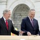 House Speaker Paul Ryan, right, and Senate Majority Leader Mitch McConnell, left, laugh at Senator Charles Schumer during a ceremony to drive in the first nails to signify the start of construction on the 2017 presidential inaugural platform on Capitol Hill in Washington.