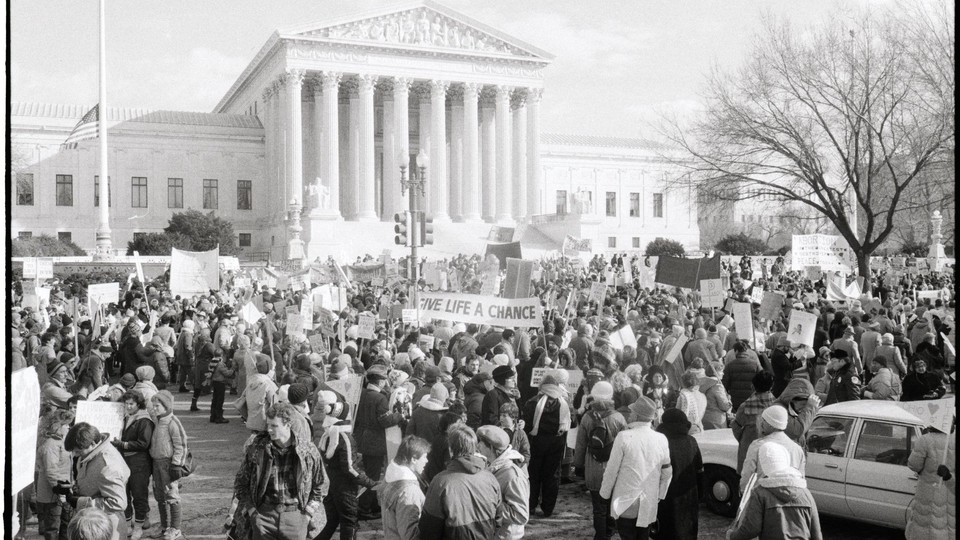 Anti-abortionists demonstrate in front of the Supreme Court against the court's 1973 decision to legalize abortion. 